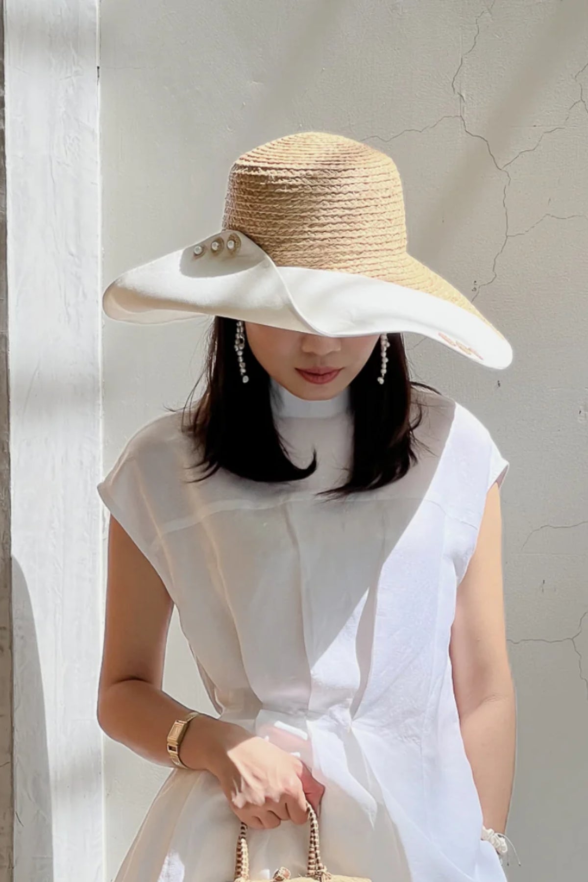 Romy wide brim hat from natural raffia and off-white canvas