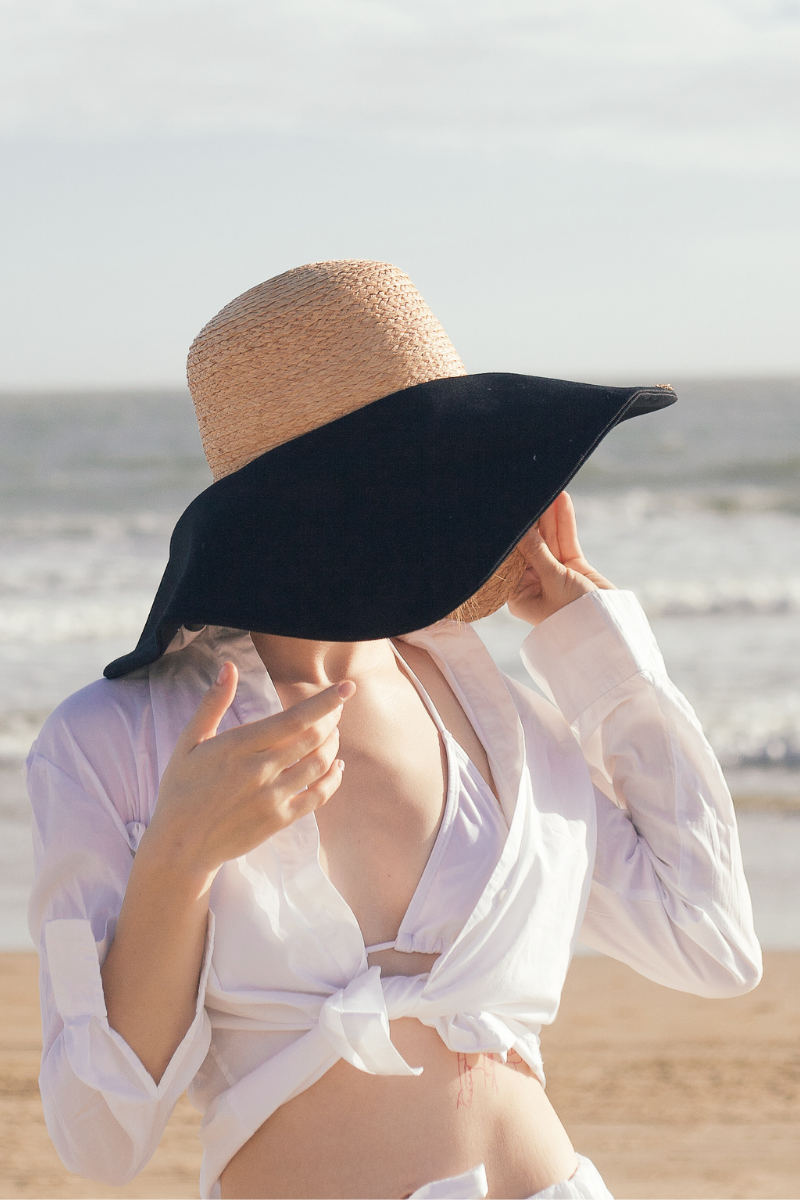 Romy wide brim hat from natural raffia and black cotton canvas
