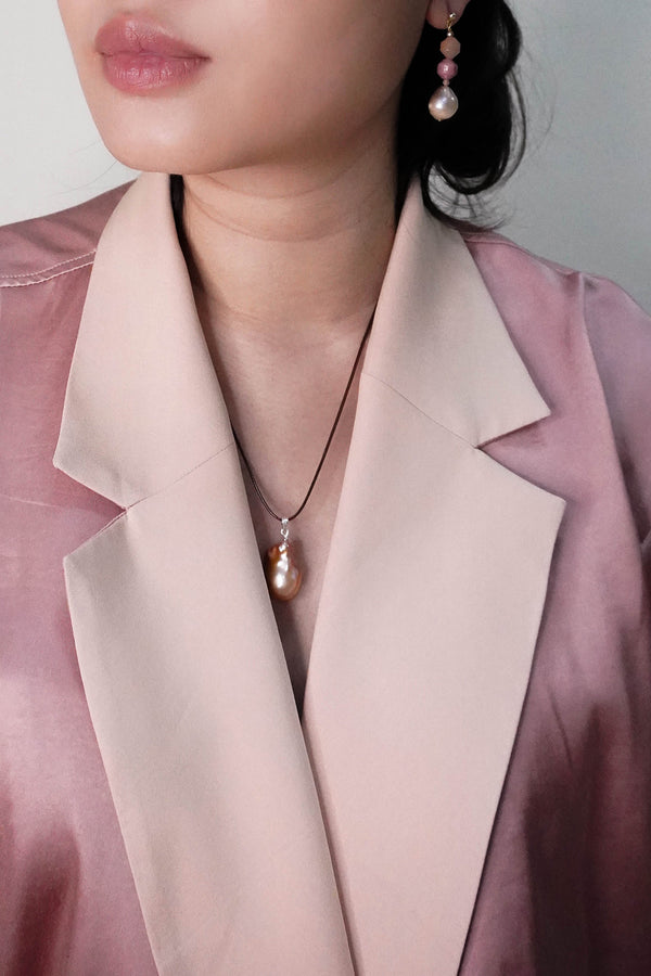 Consus  Sunset baroque pearl necklace on a brown cord