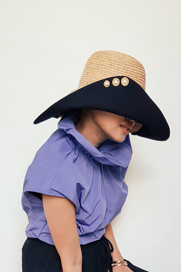 Romy wide brim hat from natural raffia and black cotton canvas