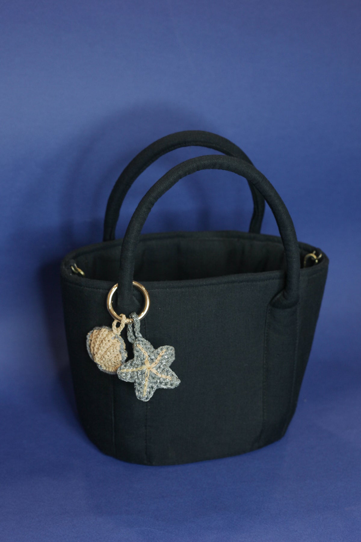 Silver starfish & raffia shell charm