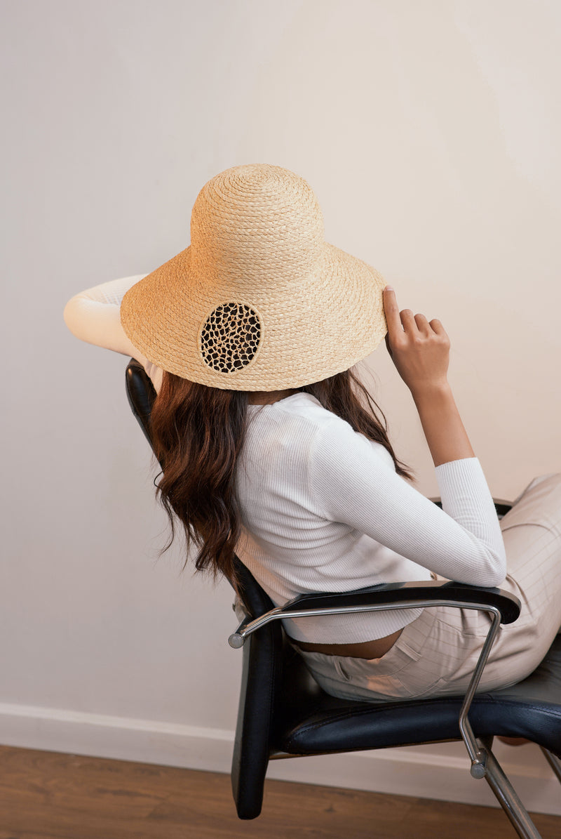 Sandra raffia hat with downturn brim and perforated pattern