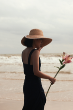 Load image into Gallery viewer, Sunrise raffia straw hat with a round crown and V-shape detail on the brim