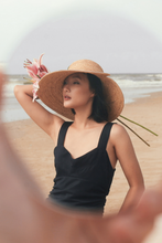 Load image into Gallery viewer, Sunrise raffia straw hat with a round crown and V-shape detail on the brim