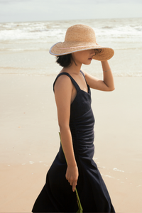 Sunrise raffia straw hat with a round crown and V-shape detail on the brim